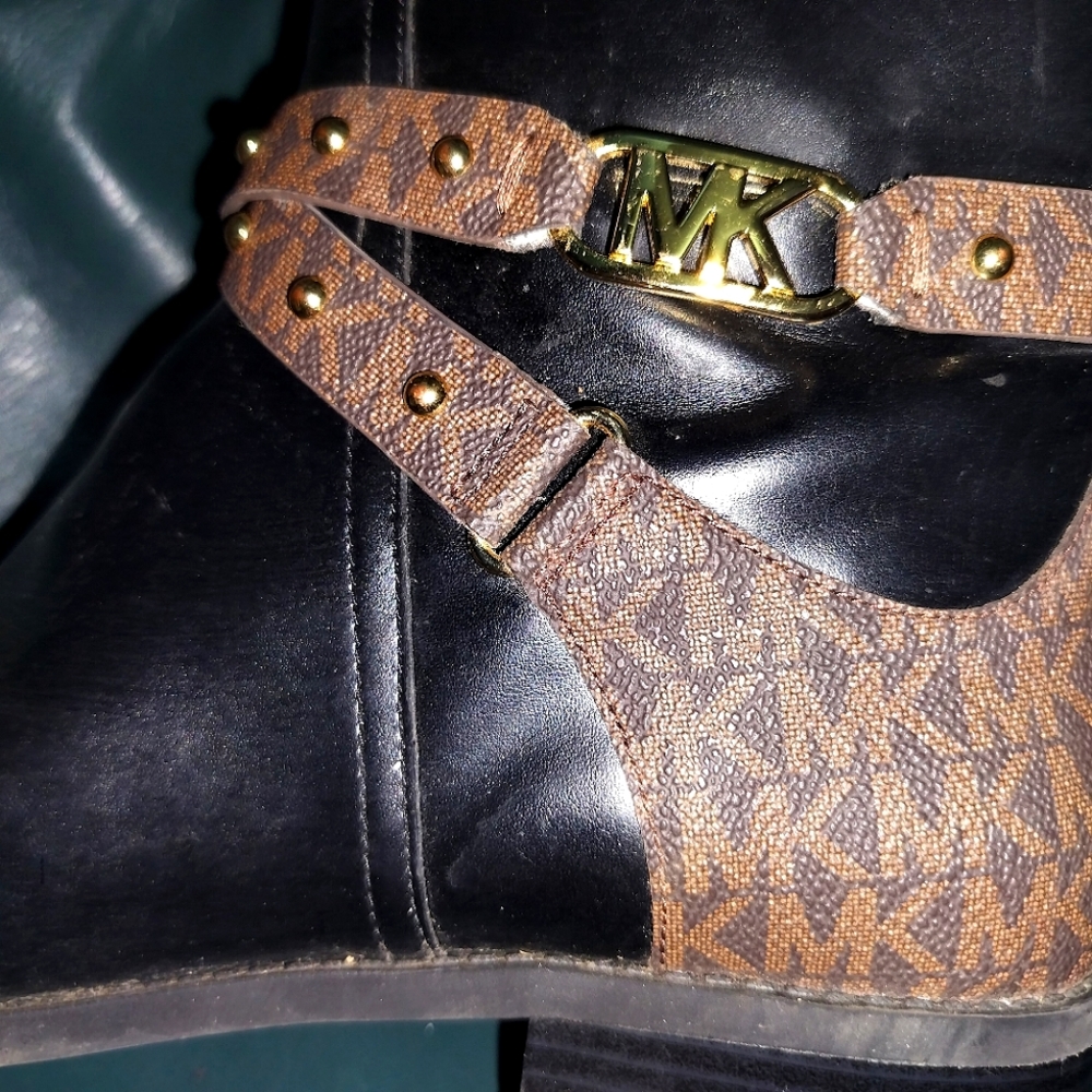 Michael Kors knee high boots size 11M. They are black with the MK EMBLEM